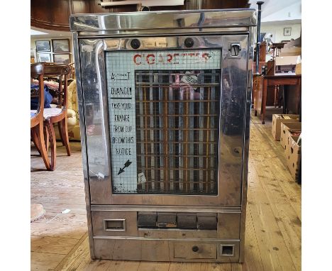 A 20th century Automat wall hanging cigarette dispenser, in a chrome case, 92 x 61 cm 