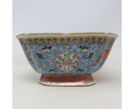 A Chinese famille rose dish, of shaped square form, decorated flowers and foliage, seal mark, some loss to enamel, 18 cm squa