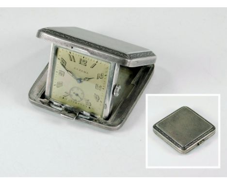ESZEHA TRAVEL CLOCK. An Art Deco, Eszeha small travel clock in silver engine turned case.  All clocks in this auction are pre