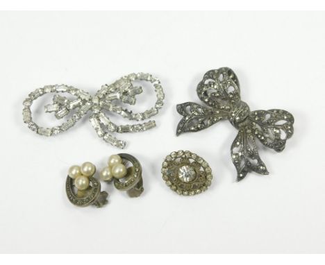 MARCASITE ETC. A silver & marcasite 'bow' brooch & a pair of marcasite & faux pearl ear clips. Also, two paste set brooches. 