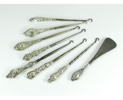 BUTTON HOOKS ETC. Seven various silver mounted Victorian button hooks, various dates & a small silver mounted shoe lift, Ches