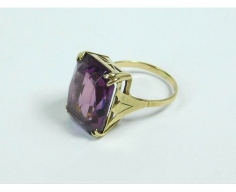 DRESS RING. A 9ct. gold amethyst set dress ring. Size N.  Please note that all items in this auction are previously owned & a