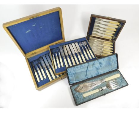 CASED FLATWARE. A Victorian fish serving knife & fork, each with ivory handle, in fitted case. Also, two other sets of fish k
