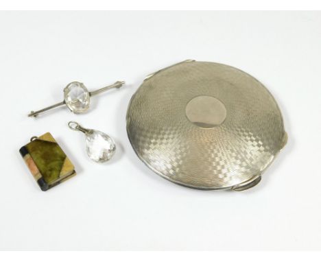 SILVER COMPACT ETC. An engine turned silver powder compact (Lacks glass), an Edwardian crystal pendant & similar Sterling sil