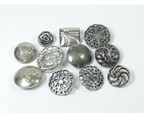 BUTTONS. An Art Nouveau cast & pierced metal button & various other buttons including lustred glass, metal & two uniform butt