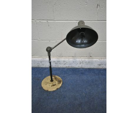 A VINTAGE TABLE TOP INDUSTRIAL WORK LAMP, with a single angled joint, on a painted base, with a plaque reading 'Sol-Tan' (con