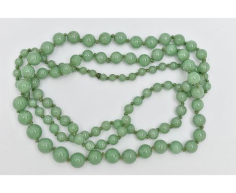 A JADE BEAD NECKLACE, designed as a graduated row of spherical beads measuring approximately 5mm to 9mm, length 920mm, approx