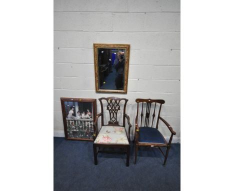 AN EDWARDIAN MAHOGANY ARMCHAIR, with geometric design back rest, open armrests, turned supports, legs and stretchers, a Chipp