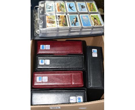 SIX ALBUMS OF CIGARETTE &amp; TRADE CARDS containing approximately seventy-six sets and part-sets from Carreras, B. Morris, J