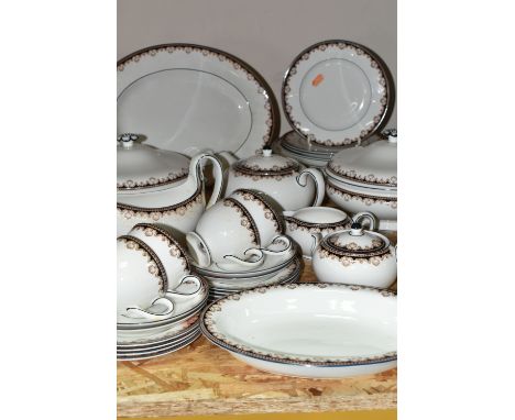 A FORTY THREE PIECE WEDGWOOD 'MEDICI' PATTERN DINNER SERVICE, comprising one meat plate, two covered circular tureens, a vege