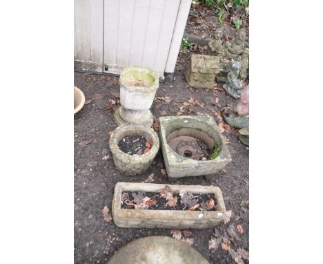 FOUR MODERN COMPOSITE GARDEN PLANTERS including an oblong  and a circular planter with brickwork patterning etc