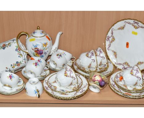 A GROUP OF TEA WARE, comprising a sixteen piece Aynsley part tea set printed and tinted with garlands and ribbons, a thirteen