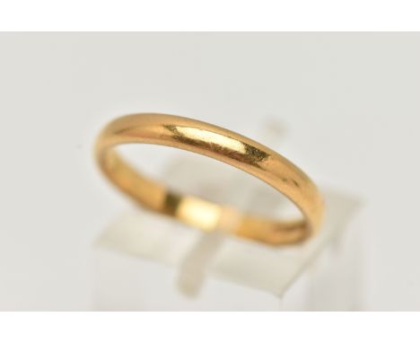 A 22CT YELLOW GOLD WEDDING RING, designed as a plain polished court shape cross section band, approximate ring size P, hallma