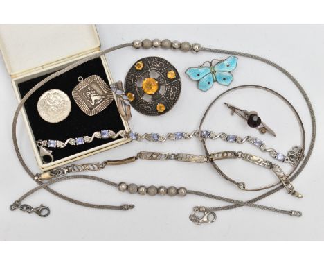 A SMALL QUANTITY OF JEWELLERY, to include a white metal and blue enamel butterfly brooch, stamped 'Sterling Silver', a white 