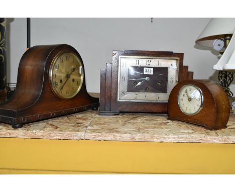 A GROUP OF THREE ART DECO WOODEN CASED MANTEL CLOCKS, comprising a square stepped clock mechanism marked  Kienzle 103719 with