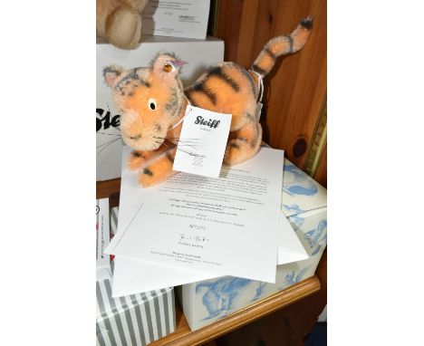 A BOXED STEIFF 'TIGGER', 354977 a light brown/black limited edition 570/2000, height 19cm, white tag, cardboard swing tag, go