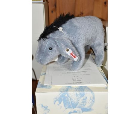 A STEIFF LIMITED EDITION 'EEYORE', 139/2000, gold button, white label 354960, pale blue mohair, height 22cm, with certificate