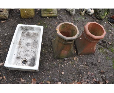 A VINTAGE SHALLOW BELFAST SINK AND TWO CHIMNEY POTS sink width 75cm depth 44cm height 17cm chimneys 47cm high