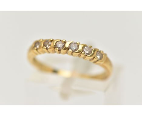 AN 18CT GOLD DIAMOND BAND RING, six round brilliant cut diamonds, prong set in yellow gold, hallmark very rubbed, faint 750 o