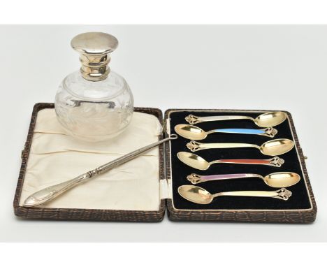 A CASED SET OF TEASPOONS AND A SCENT BOTTLE, a set of six gilt metal and colourful enamel teaspoons, guilloche enamel handles