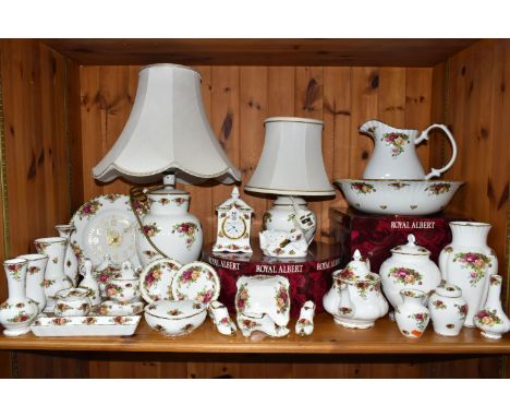 A GROUP OF ROYAL ALBERT 'OLD COUNTRY ROSES' GIFTWARE, comprising a mantel clock, height 17cm, two table lamps, a pomander in 