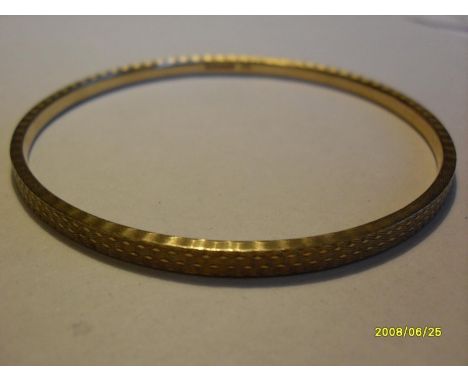 A 9ct gold bangle, Birmingham hallmark, 24g approx 