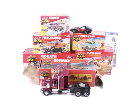 A collection of Kenner Mask vehicles in two boxes. Including Switchbalde, Firecracker, Goliath and Raven etc plus a selection