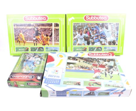 A collection of four Subbuteo sets. Mostly complete including Euro 96 special edition, all in original boxes. 