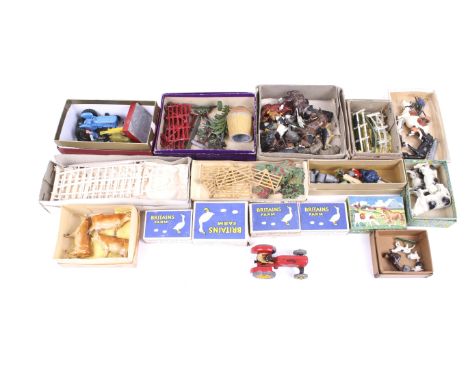 A collection of diecast farming toys and accessories. Comprising a Matchbox Fordson tractor and a range of livestock includin