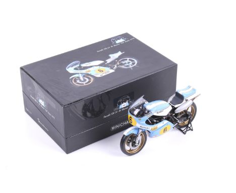 A Minichamps 1:12 scale diecast Barry Sheen Suzuki XR14 motorcycle. In blue and white livery, in original box. 