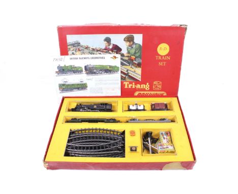 A OO gauge Tri-ang train set. Comprising a 2-6-2 BR tank engine with a range of wagons plus track and accessories, in origina