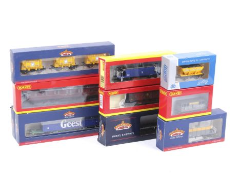 A OO gauge collection of goods wagons and coaches. Comprising Bachmann and Hornby noting Hoppers, Bogies and Cement Wagons et