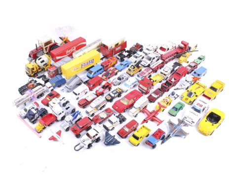 A mixed collection of diecast vehicles. Including Matchbox, Corgi, Britains and others noting trucks, cars, buses and a tract