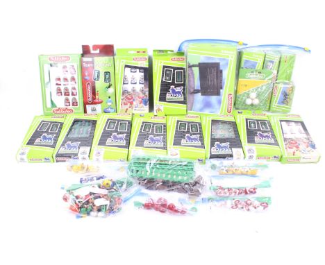 A collection of Subbuteo teams and accessories. Comprising 12 boxed ses including Blackburn Rovers and Manchester City togeth