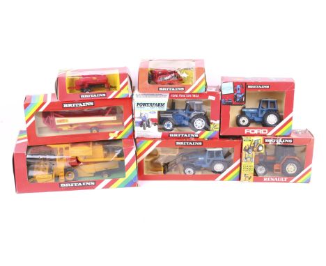A collection of Britians 1:32 scale farm machinery. Comprising a New Holland Combine Harvester no. 9575, a Ford 7710 tractor 