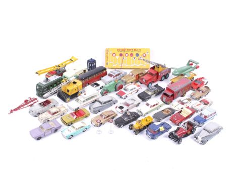 A collection of playworn vintage die cast vehicles. Noting Dinky and Corgi with Chipperfields Circus, James Bond, BBC camera 
