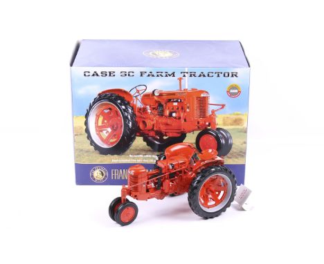A Franklin Mint 1:12 scale Case SC tractor. In orange with black trim, in original box. 