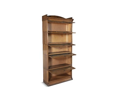 AN OAK 'LEBUS' STACKING BOOKCASE,of compact upright rectangular form, in five sections, each section with glazed fall-front d