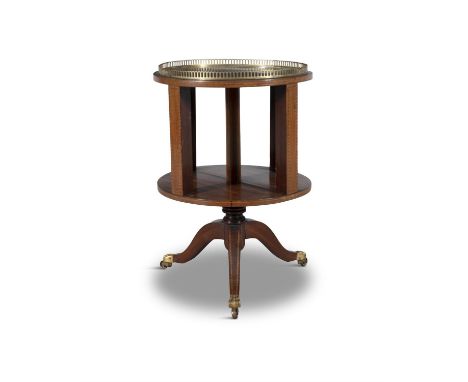 A SHERATON REVIVAL INLAID MAHOGANY CIRCULAR REVOLVING BOOK CASE/OCCASIONAL TABLEwith pierced brass gallery rail and raised on