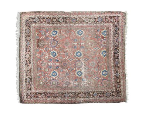 A 'HERIZ' STYLE CARPET 200 x 200cmthe central reserve woven with guls and geometric patterns against a pink ground, contained