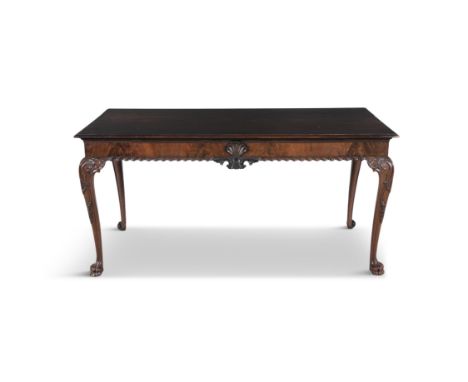 A FINE ENGLISH MAHOGANY CARVED SIDE TABLE 19th century, of rectangular form with solid panel top above a shell carved frieze,