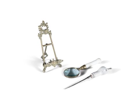 A COLLECTION OF DESK ACCESSORIEScomprising:- a bone handled letter opener, the handle carved in the form of a duck head- a bo