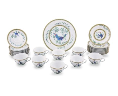 A HERMES PORCELAIN LIMOGES 'TUCAN PATTERN' TEA SERVICE, COMPRISING;- one large plate- eight side plates- eight cups- eight sa