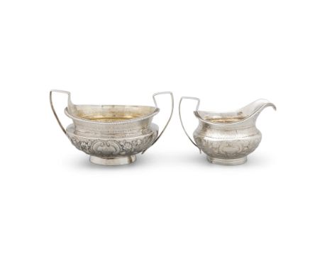 A GEORGE III SILVER SUGAR BOWL AND MATCHING MILK JUGLondon 1802, mark of R. & S. Hennell of circular baluster form with gadro