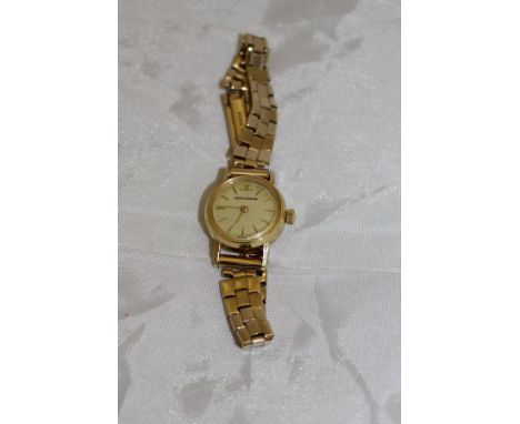 A lady's 18ct gold cased Jaeger-LeCoultre wristwatch numbered B41165 to back CONDITION REPORTS Dial, movement and case appear