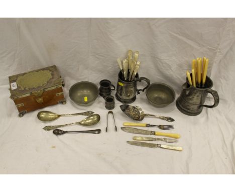 A Victorian oak tea caddy with silver plated mounts and silver plated lid, a pewter quart tankard / jug, a pair of Tudric bea