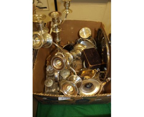 A box containing a 19th Century tortoiseshell snuff mull, a pair of three-light two-branch candelabra, plated card tray, plat