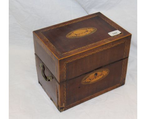 An early 19th Century mahogany and inlaid cased decanter box containing six gilt decorated square blown decanters with white 