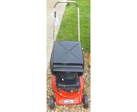 A Rover petrol lawnmower with a Briggs & Stratton Quantum XE40 engine, and a garden groom hedge trimmer