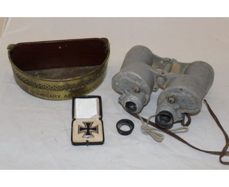 A pair of large grey painted military / naval binoculars, bearing impressed mark "8 x 60 2111081 blc", a semi-circular brass 